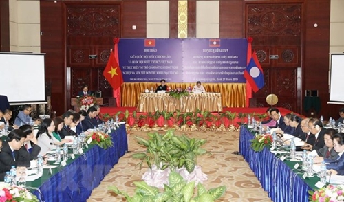 Legislatures of Vietnam, Laos share experience at joint workshop